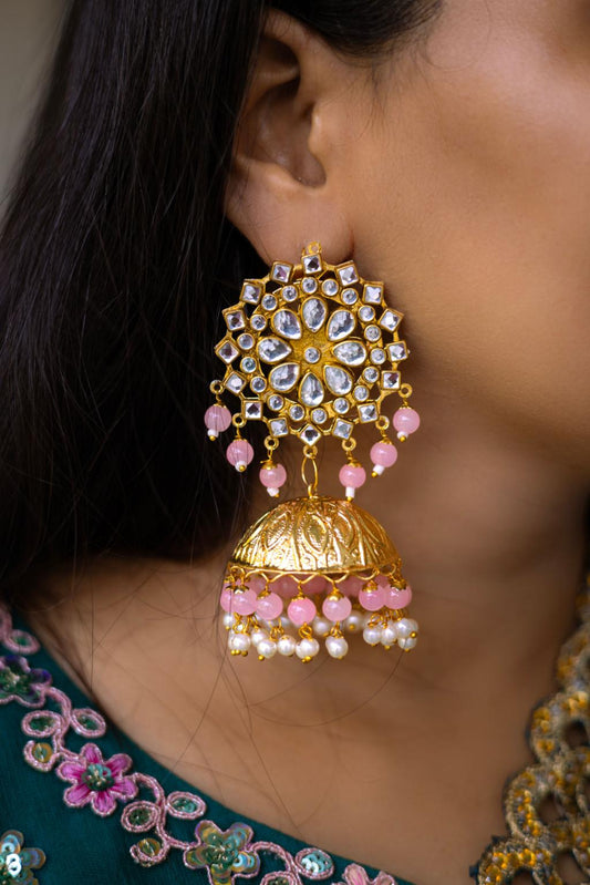 Elegant gold statement earrings luxury jewellery fashion styling