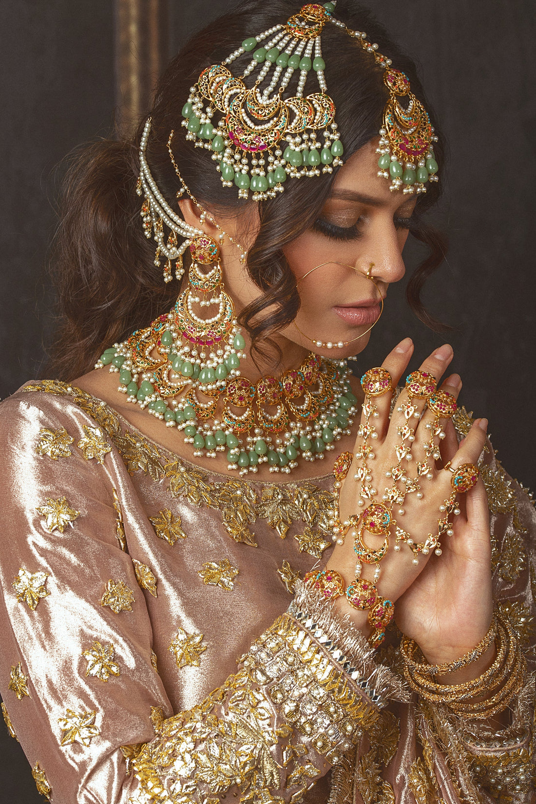 Minimalist handcrafted Pakistani jewellery photographed in a luxury studio setting, highlighting emotional elegance and fine craftsmanship.