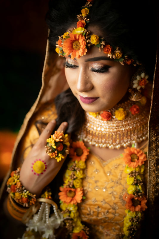 woman in yellow and white floral hijab