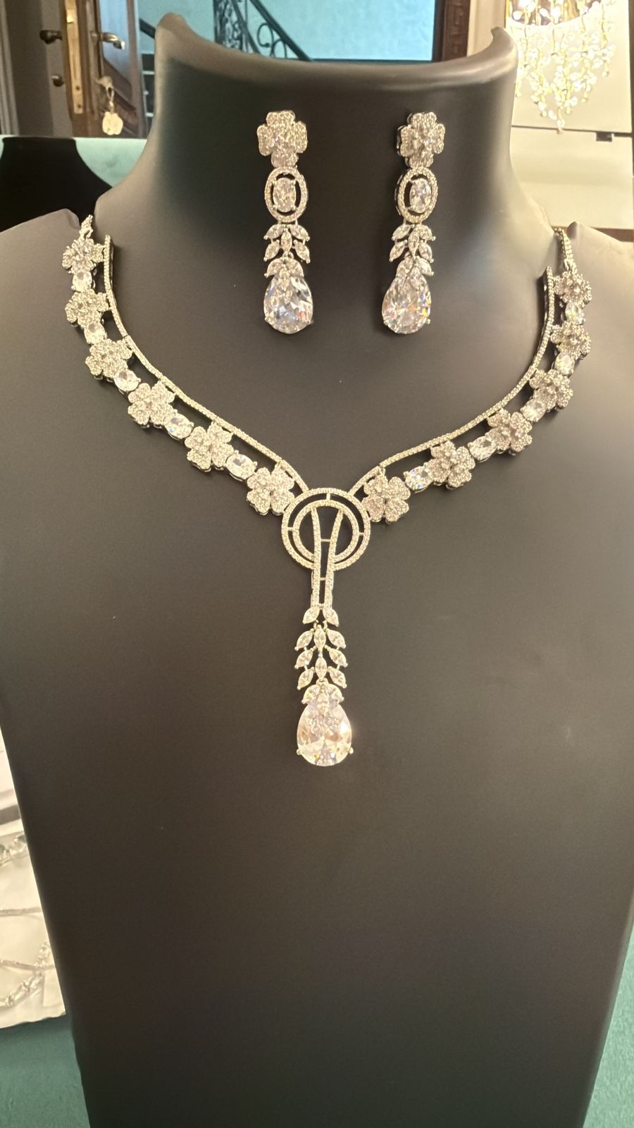 Jewelry set with necklace and earrings on a mannequin